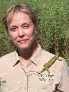Becci Crowe in Africa with a chameleon